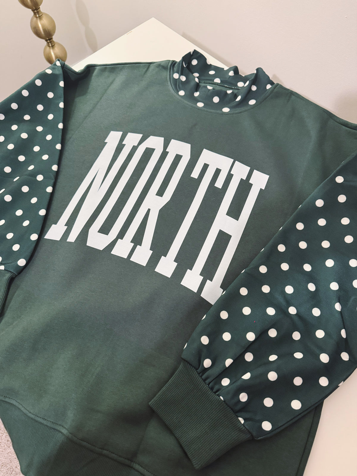 NORTH Dotted Sleeve Mock Neck